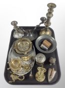 A group of metal wares, table candelabrum, candlesticks,