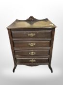 A late Victorian ebonised four drawer music chest,