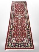 An Eastern woolen runner 252 cm x 85 cm