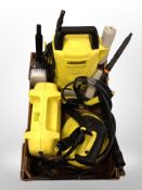 A box of Karcher K2 pressure washer etc