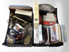 Two crates of jigsaws, boxed placemats and coasters, ceramics, brassware, companion set,