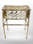 A 19th century brass footman,