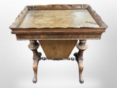 A Victorian mahogany work table,