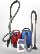 Two Miele vacs and a further boxed attachment