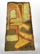 A 1970's rug 157 cm x 73 cm