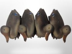 Four decoy ducks