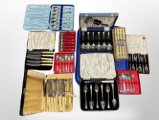 A group of boxed cutlery