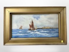 A Moore (British, Early 20th century) : Fishing boats at sea, oil on canvas, 60 cm x 30 cm,