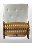 A pine 4'6 bed frame and mattress