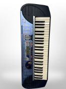 A Yamaha PSR-140 keyboard and stand