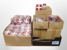 Two boxes of Southern Comfort plastic boxes and baubles