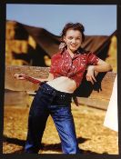 A photograph depicting Marilyn Monroe after Andre de Dienes