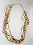 A carved bone necklace