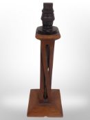 An Arts and Crafts oak lamp base,