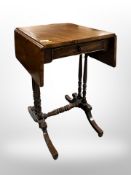 A Victorian mahogany drop leaf occasional table fitted a drawer,