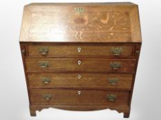 A 19th century oak fall front bureau,
