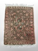 A small Afghan Bokhara rug 76 cm x 51 cm
