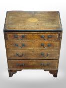 An Edwardian inlaid mahogany bureau,