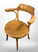 A beech bentwood armchair