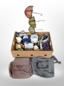 A box of collector's teapots, canvas bags,