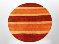 A contemporary circular rug,