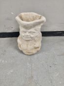 A concrete Toby jug planter height 42 cm