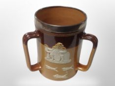 A Royal Doulton triple-handled earthenware jug with silver rim together with three Victorian blue