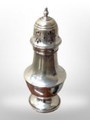 A silver sugar castor,
