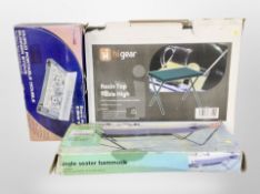 A group of camping items, boxed hammock, gas burner, foot pump, sleeping bag etc,