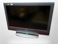 A Sony Bravia 32 inch LCD TV with lead and remote