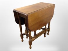 A mahogany drop leaf table,