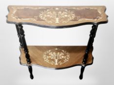 An Italian style serpentine two tier side table,