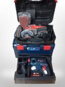 A Bosch hammer drill in case and a Black and Decker sander