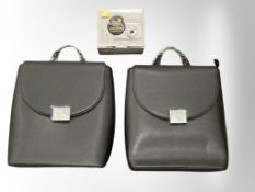 Two new lady's back packs and a Nikon Coolpix digital camera