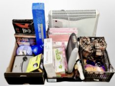 Three boxes of vac storage bags, tripod in box, linen, two folding easels, umbrellas,