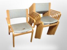 A set of six 20th century Danish laminated beech stacking chairs in striped upholstery