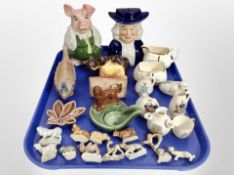 A group of ceramics, Wade whimsies, long boat, Wade Nat West pig,