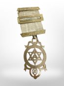 A 9ct yellow gold medal on ribbon CONDITION REPORT: Approximately 5g.