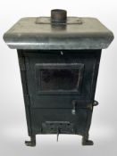 A cast iron log burner,