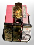 Four Chinese export lacquered table screens in boxes