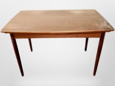 A 1970's Danish teak dining table,
