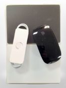 An Apple mouse model A1657 and two further track pads model A1535