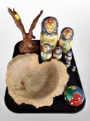 A burr wood fruit bowl together with a cast resin figure of an eagle,