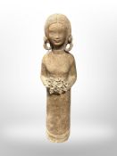 A Danish pottery figure of a girl holding a bouquet of flowers, signed J Vourstone,