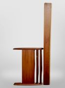 A 1970's teak 3' bed frame