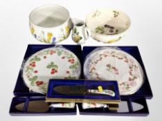 A boxed Royal Worcester porcelain cake stand, further cake knives,