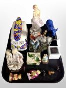 A group of ornaments, cow parade figure, ceramic camper van, Wade whimsies,