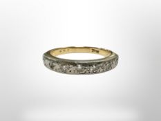 An 18ct yellow gold seven stone diamond ring, size O. CONDITION REPORT: 4.2g.