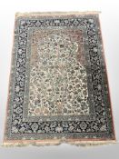 A machine-made rug of Indian Tree of Life design,