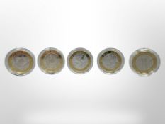 Five silver proof commemorative £2 coins.